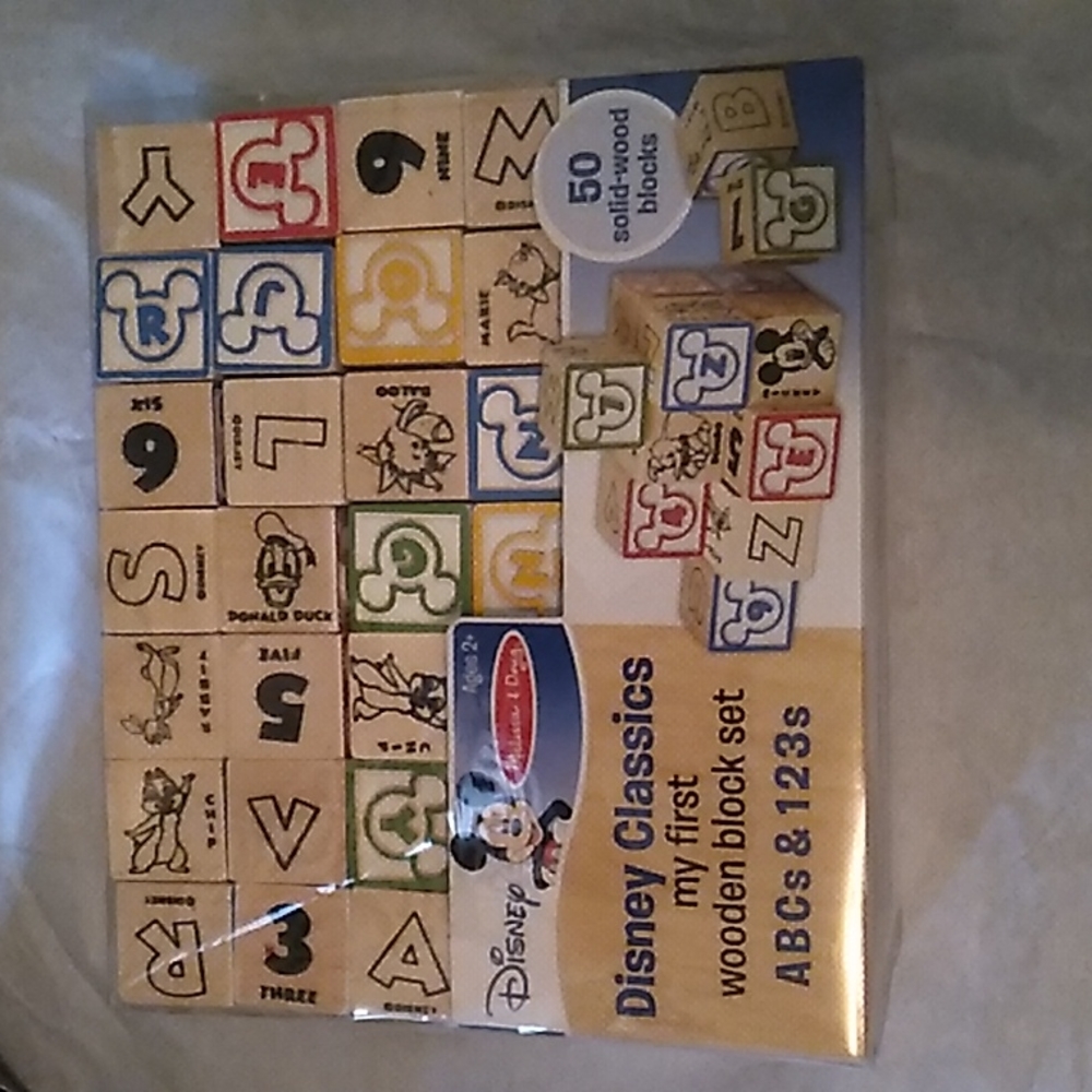 Disney Melissa and Doug wooden block set. NIB